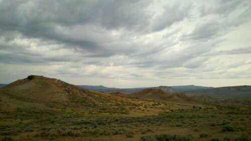 In my blogging spot in the Hanna Basin of Wyoming. If you look really hard, you can see our camp in the lower right.